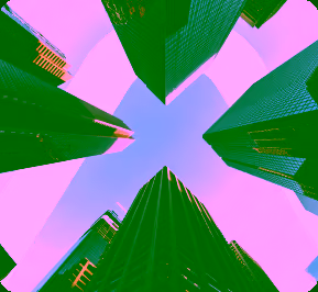 Upward view of tall skyscrapers with a clear blue sky in the center.